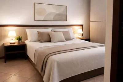 Letto o letti in una camera di Domo - Guest-House Il Nespolo Fiorito