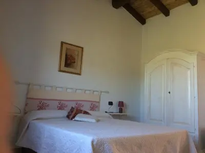 Letto o letti in una camera di Tenuta Don Ballore Country Resort