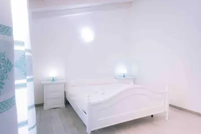 Letto o letti in una camera di Seaside Villa 2BR-1BA. 7 min walk to the beach