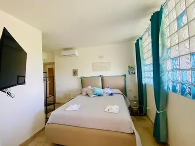 Letto o letti in una camera di Sardinia Art House