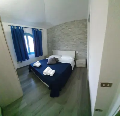 Letto o letti in una camera di Li Piri