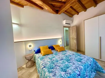 Letto o letti in una camera di Villa Azzurra