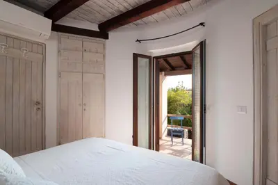 Letto o letti in una camera di Villa Ponente