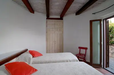Letto o letti in una camera di Villa Ponente
