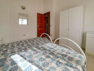 Letto o letti in una camera di Appartamento Bilocale Valentina's House San Teodoro