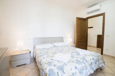 Letto o letti in una camera di Le Viole