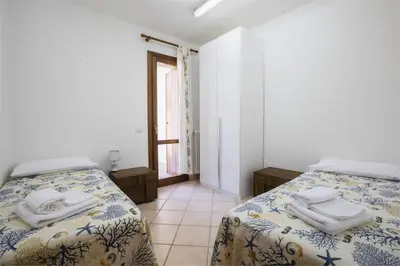 Letto o letti in una camera di Le Viole