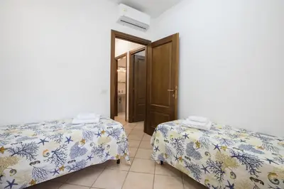 Letto o letti in una camera di Le Viole