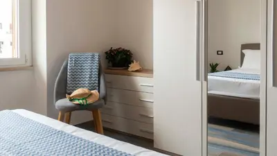 Letto o letti in una camera di Gabbiani Loft - Cala Gonone