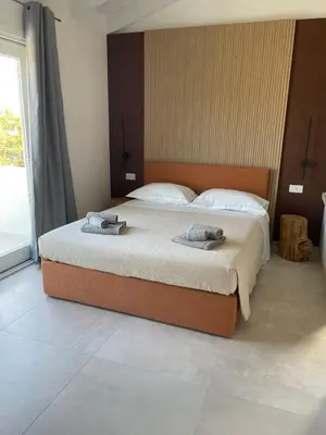 Letto o letti in una camera di Villa Est