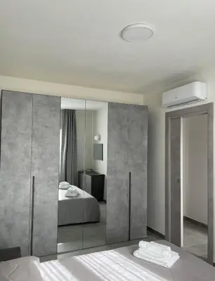 Letto o letti in una camera di Olbios Apartment