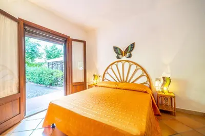 Letto o letti in una camera di Trilocale i Fenicotteri