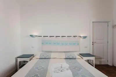Letto o letti in una camera di Resort Fior di Sardegna