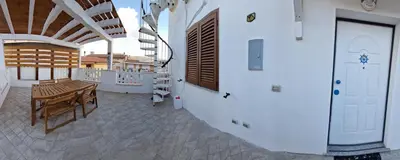 Balcone o terrazza di La Corte Sarda Centro Storico Spiagge vicine per ogni tipo di vacanza