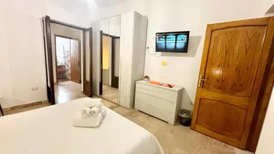 Letto o letti in una camera di CASA DEL CORSO
