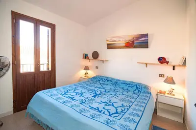 Letto o letti in una camera di CASA PAU