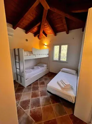 Letto o letti in una camera di Prestige San Teodoro Straula