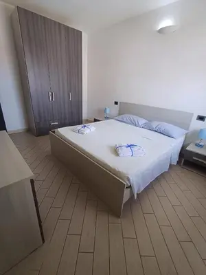 Letto o letti in una camera di APPARTAMENTO MATILDE