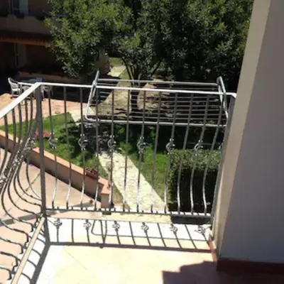 Balcone o terrazza di Villetta con giardino e posto auto