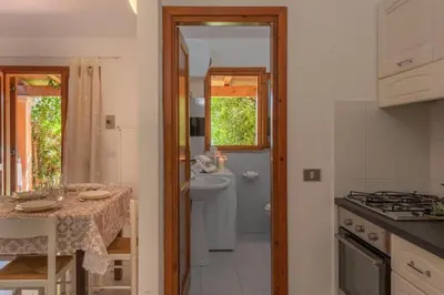 Cucina o angolo cottura di Outstanding Residenze Gallura 2 Bedroom sleeps plus Child