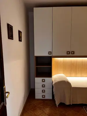 Letto o letti in una camera di Adele casa vacanza
