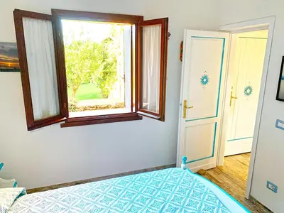 Letto o letti in una camera di Cala Paradiso Apartment 