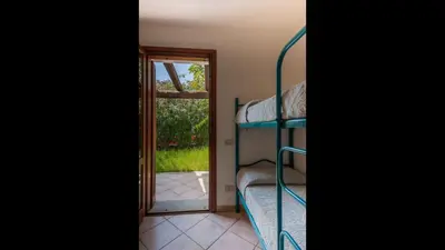 Letto o letti in una camera di Simple Gem of Le Dimore di Budoni no1947