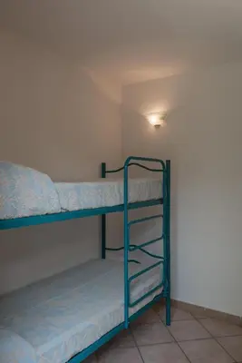 Letto o letti in una camera di Simple Gem of Le Dimore di Budoni no1947