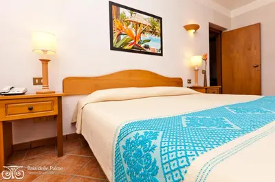 Letto o letti in una camera di Simple Gem of Le Dimore di Budoni 2 Bedroom sleeps 6