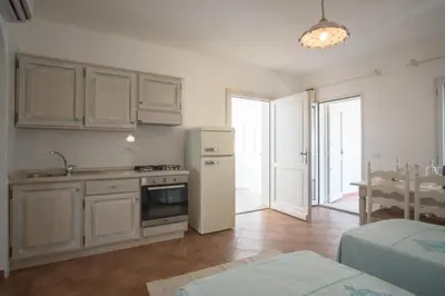 Cucina o angolo cottura di Superb Le Residenze del Golfo di Orosei num2192