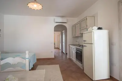 Cucina o angolo cottura di Superb Le Residenze del Golfo di Orosei no2193