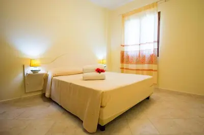 Letto o letti in una camera di Relaxing Le Residenze del Maria Rosaria num2215