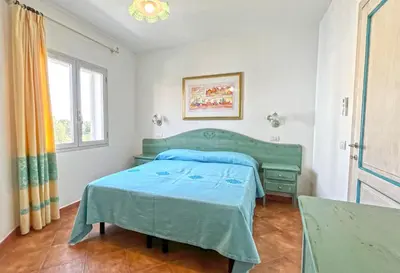 Letto o letti in una camera di Relaxing Le Residenze del Maria Rosaria num2215