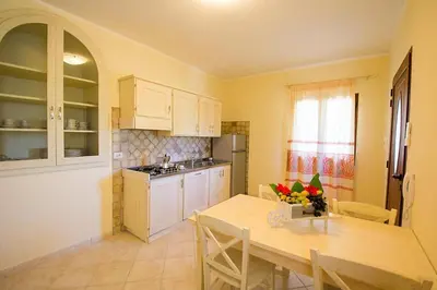 Cucina o angolo cottura di Relaxing Le Residenze del Maria Rosaria num2215
