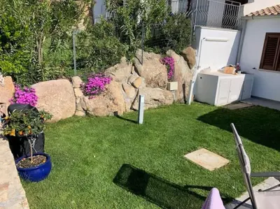 Giardino di Vista mare con piscina a Budoni - Baia Sant’Anna