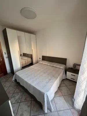 Letto o letti in una camera di Casa Fralia