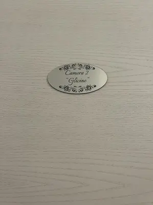 Certificato, attestato, insegna o altro documento esposto da Acquamarina Luxury Rooms