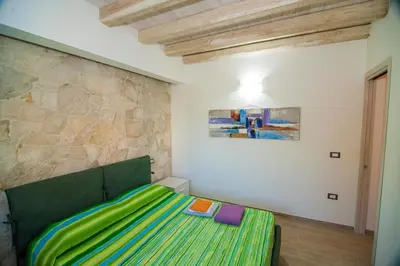 Letto o letti in una camera di Case Vacanze Budoni Beach