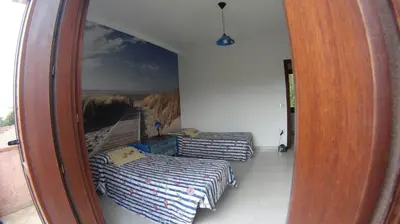 Letto o letti in una camera di Casa Sara San Teodoro