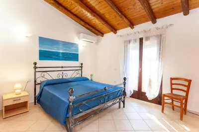 Letto o letti in una camera di Casa Teodoro