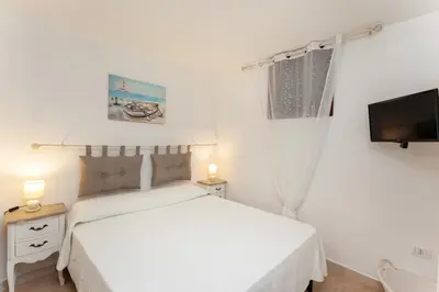 Letto o letti in una camera di Casa Teodoro