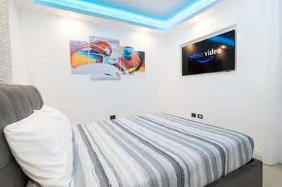 Letto o letti in una camera di Blue Island - Luxury House