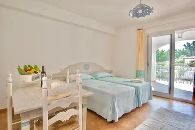 Letto o letti in una camera di Apartments with air conditioning in Orosei