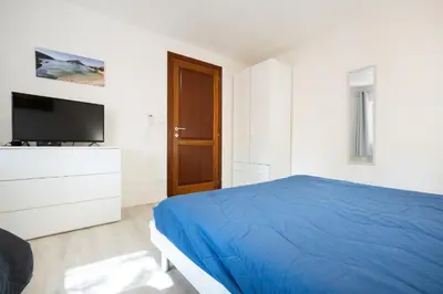Letto o letti in una camera di Appartamento “Levante” a 300m dalla spiaggia
