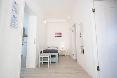 Letto o letti in una camera di Appartamento “Libeccio” a 300m dalla spiaggia