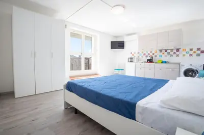 Letto o letti in una camera di Camera “Ponente” - vista mare, spiaggia a 300m