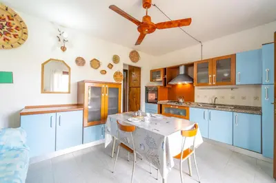 Cucina o angolo cottura di ISS Travel, Villa Fiorita - 800 m from La Cinta beach