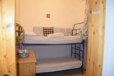 Letto o letti in una camera di Finestra sul mare