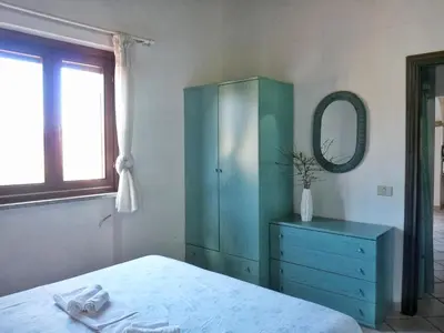 Letto o letti in una camera di Le Caterine