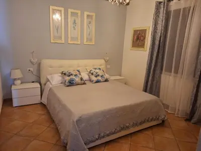 Letto o letti in una camera di Attico Anais